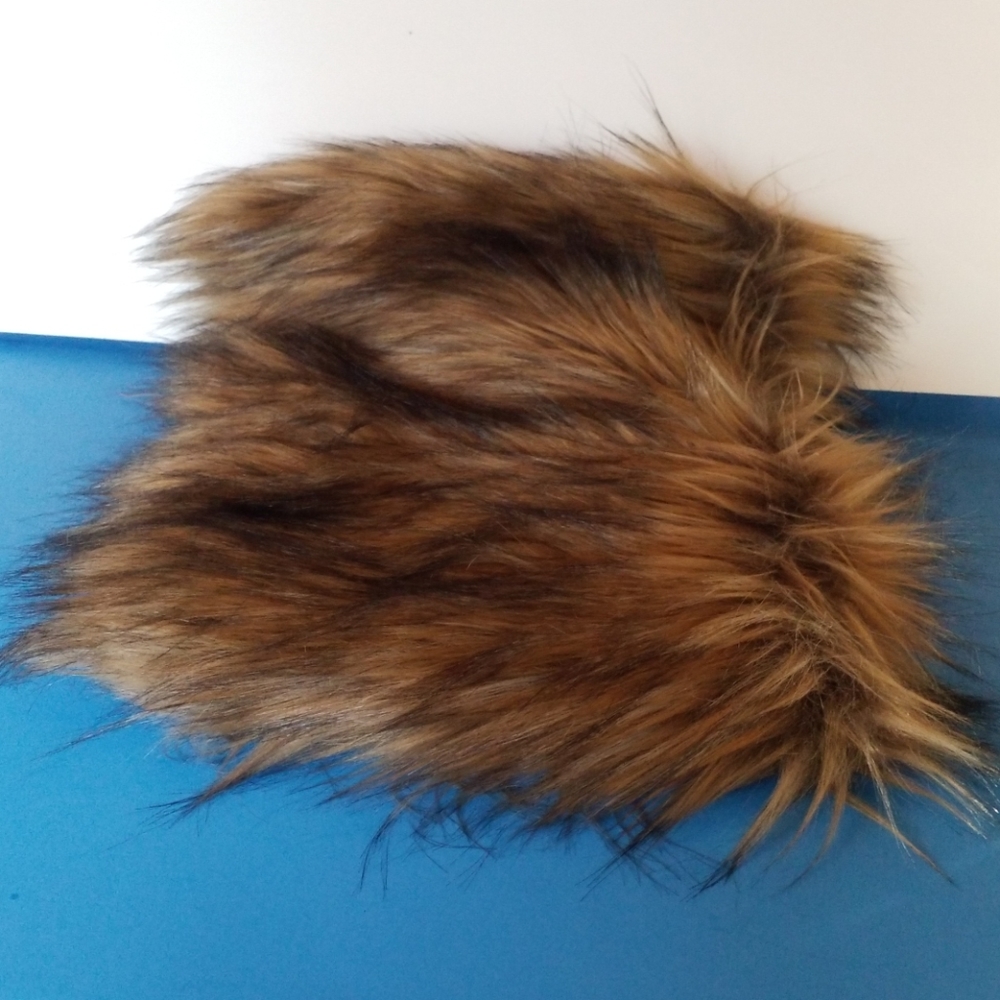 Faux fur hand muffler.